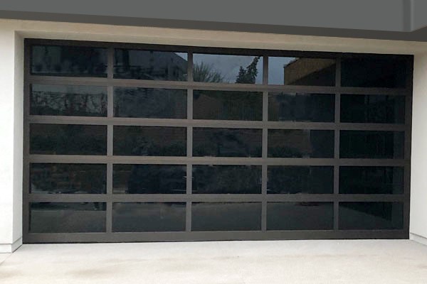 garage doors door bronze glass aluminum overhead insulated trim mirror dark steel overlay anodized windows panel vegas las carriage frame